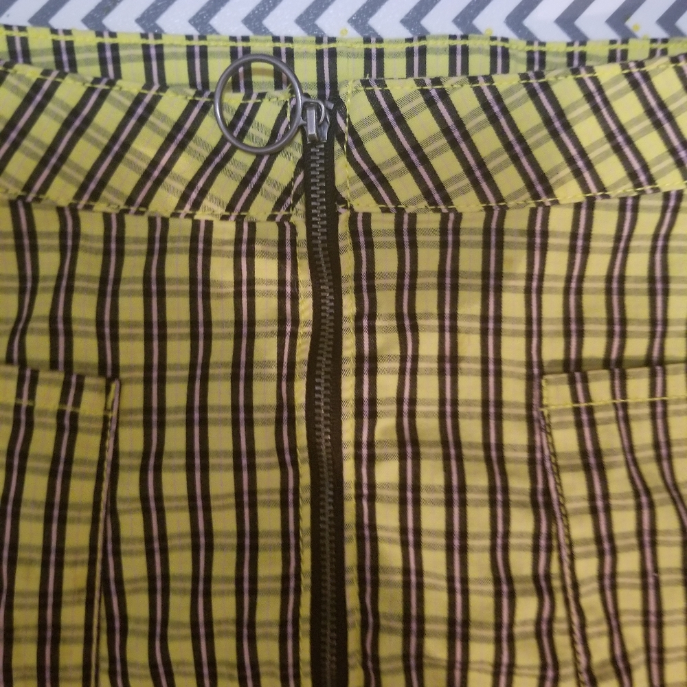 A pink and green plaid skirt